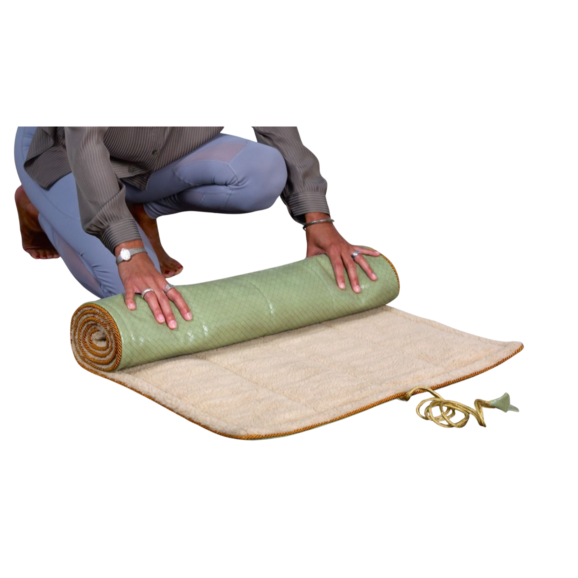Person rolling out a luxury Yoga Rug Mat, showcasing its texture and design for a yoga session.