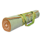Holistic Silk luxury Yoga Rug Mat rolled up with a green strap for easy carrying.