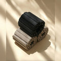 Muna Magnetic Ankle Wrist Weight in black and beige colors, designed for resistance training and low-impact exercises.