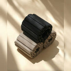 Muna Magnetic Ankle Wrist Weight in black and beige colors, designed for resistance training and low-impact exercises.