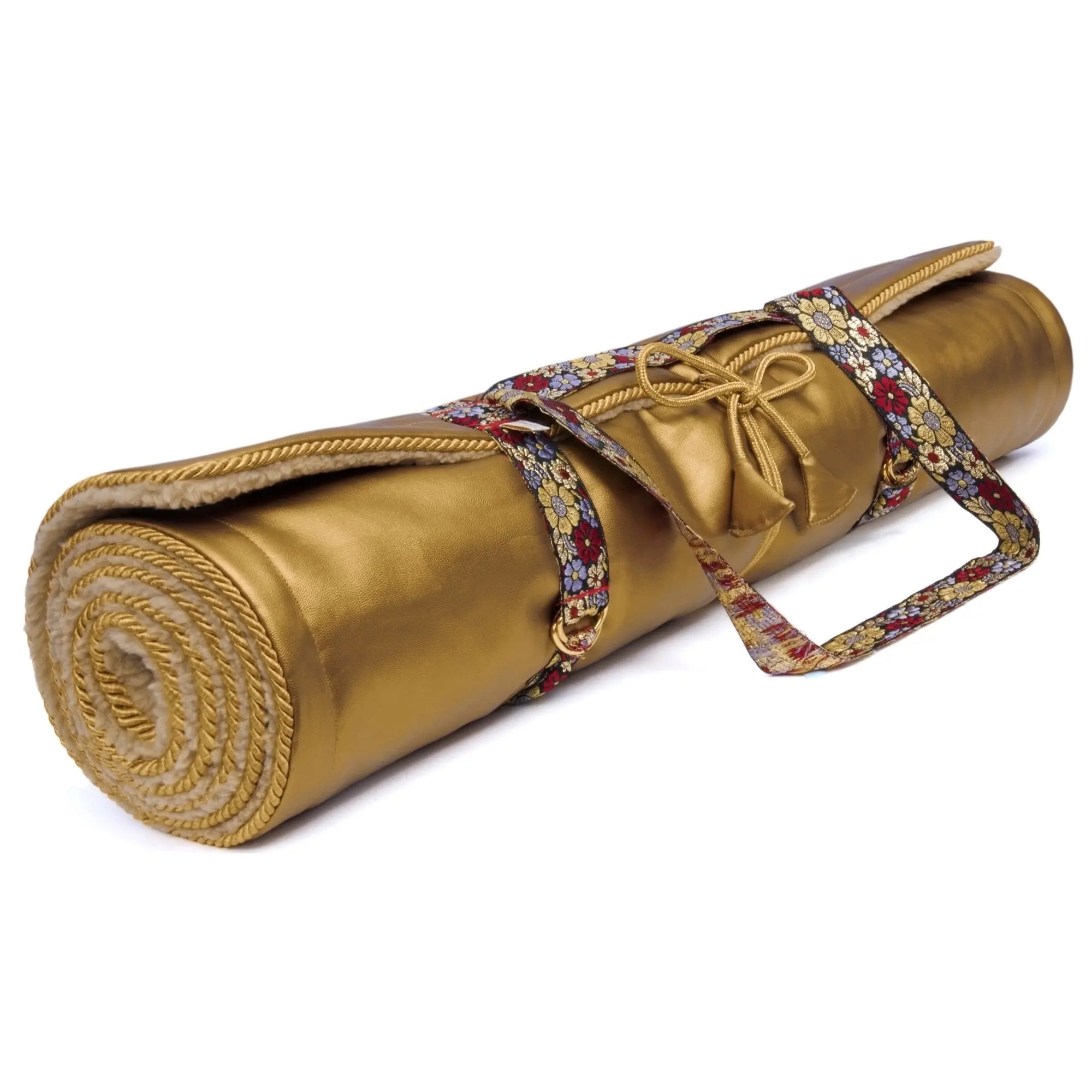 Holistic Silk luxury Yoga Rug Mat rolled up with a floral strap, showcasing a golden color and soft texture.
